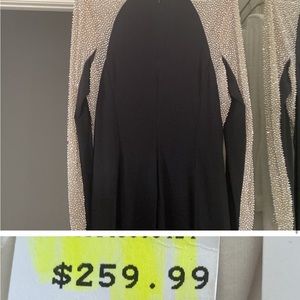 This dresses is gorgeous!! was used one time hours it’s a very nice dress!!